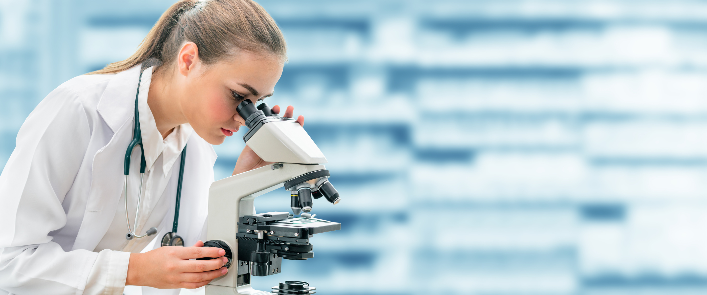 Scientist researcher uses microscope in laboratory